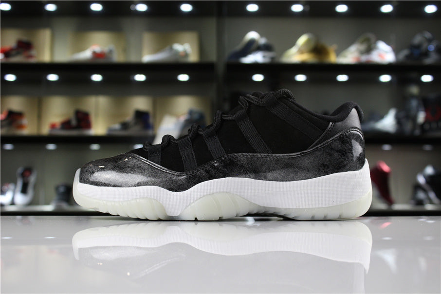 Jordan 11 Retro Low Barons Sneakers in Black White - product image from the listing.