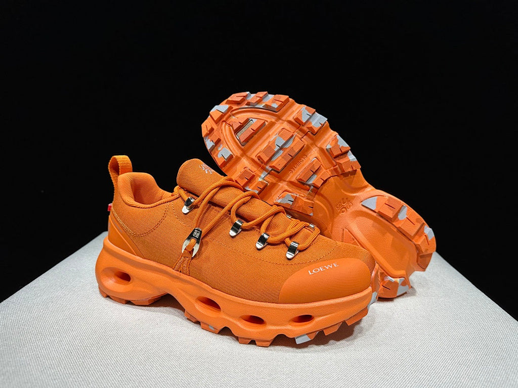On x Loewe Cloudsurfer Orange Trail Trainers - product image from the listing.