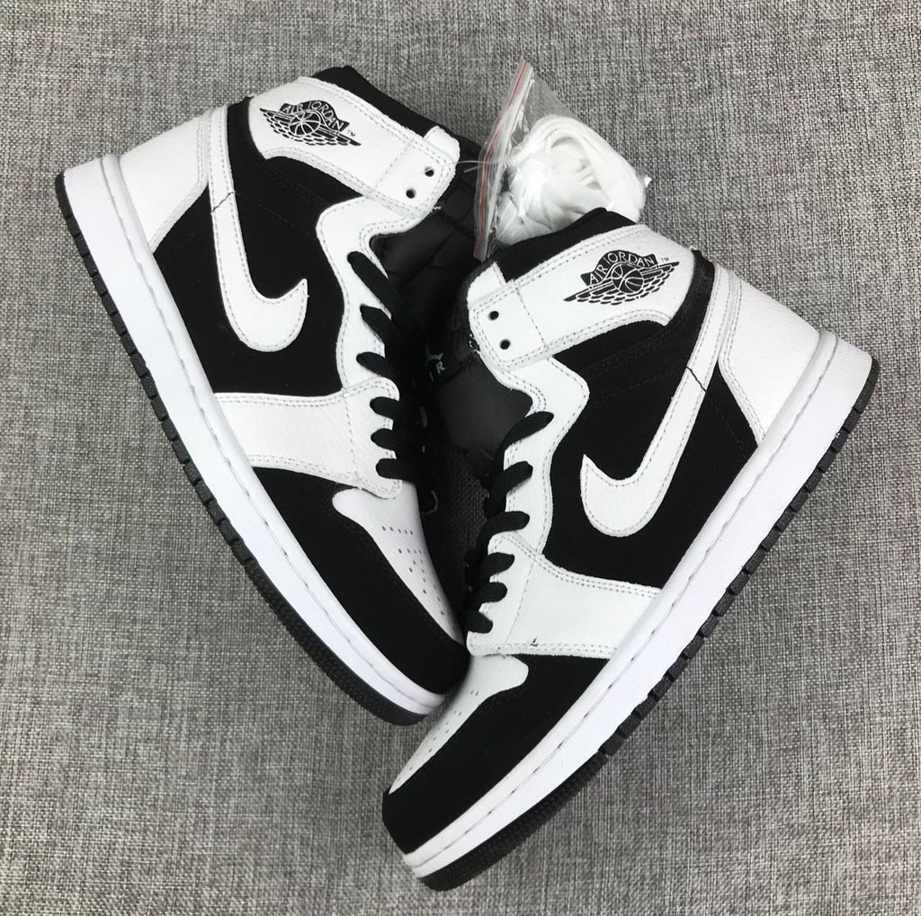 Air Jordan 1 High Sneakers in Black and White 554724-113 - product image from the listing.