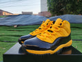 "Orange/Yellow/Black" Air Jordan 11 Retro - product image from the listing.