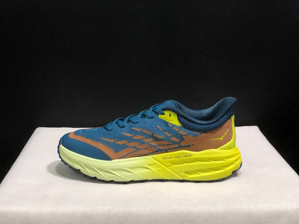 HOKA Speedgoat 6 Trail Running Shoes in Blue Yellow - product image from the listing.