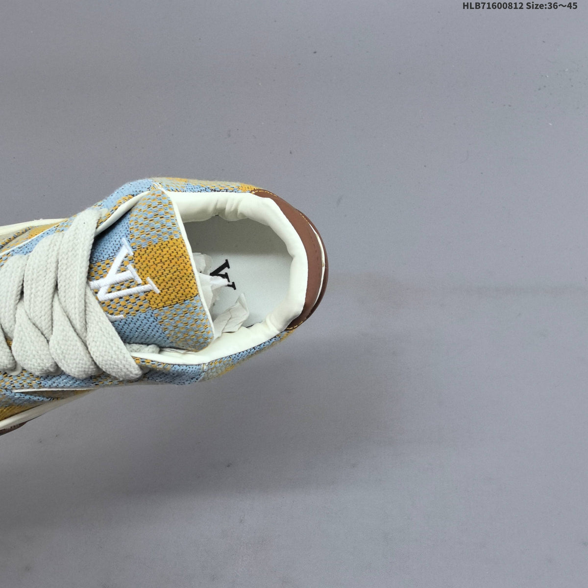 Louis Vuitton Tilted Low Trainers in Blue and Yellow Check - product image from the listing.