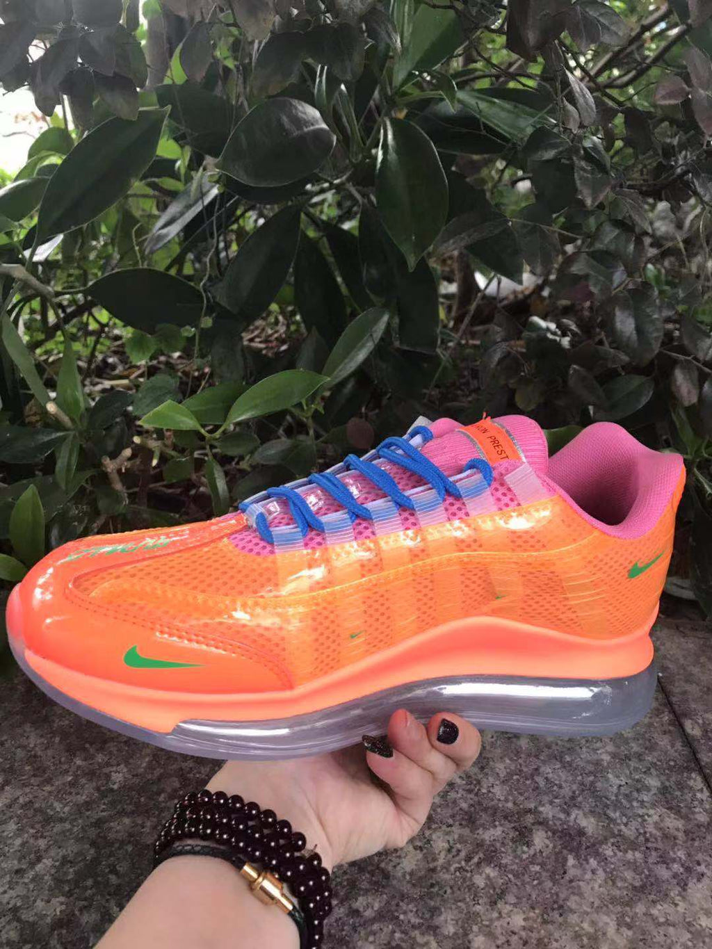 Nike Air Max 720 Sneakers in Orange, in Pink and Blue - product image from the listing.