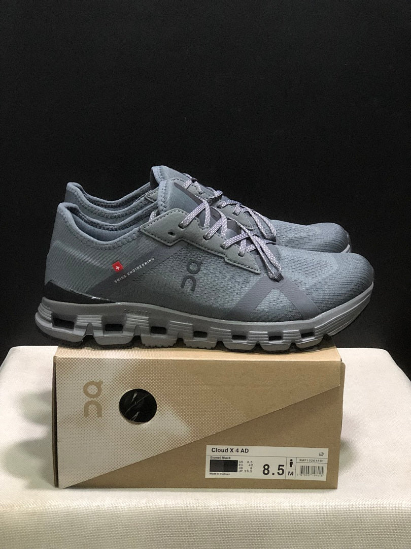 Gray and Black On Cloud X 4 AD Sneakers - product image from the listing.