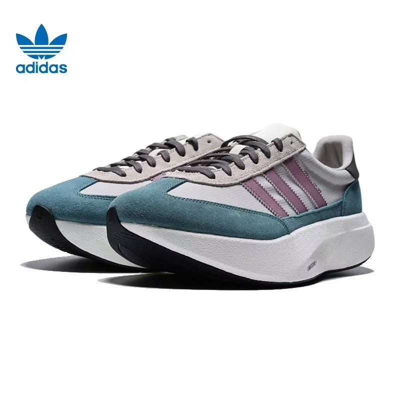 Adidas White and Green Platform Trainers with Mauve Stripes - product image from the listing.