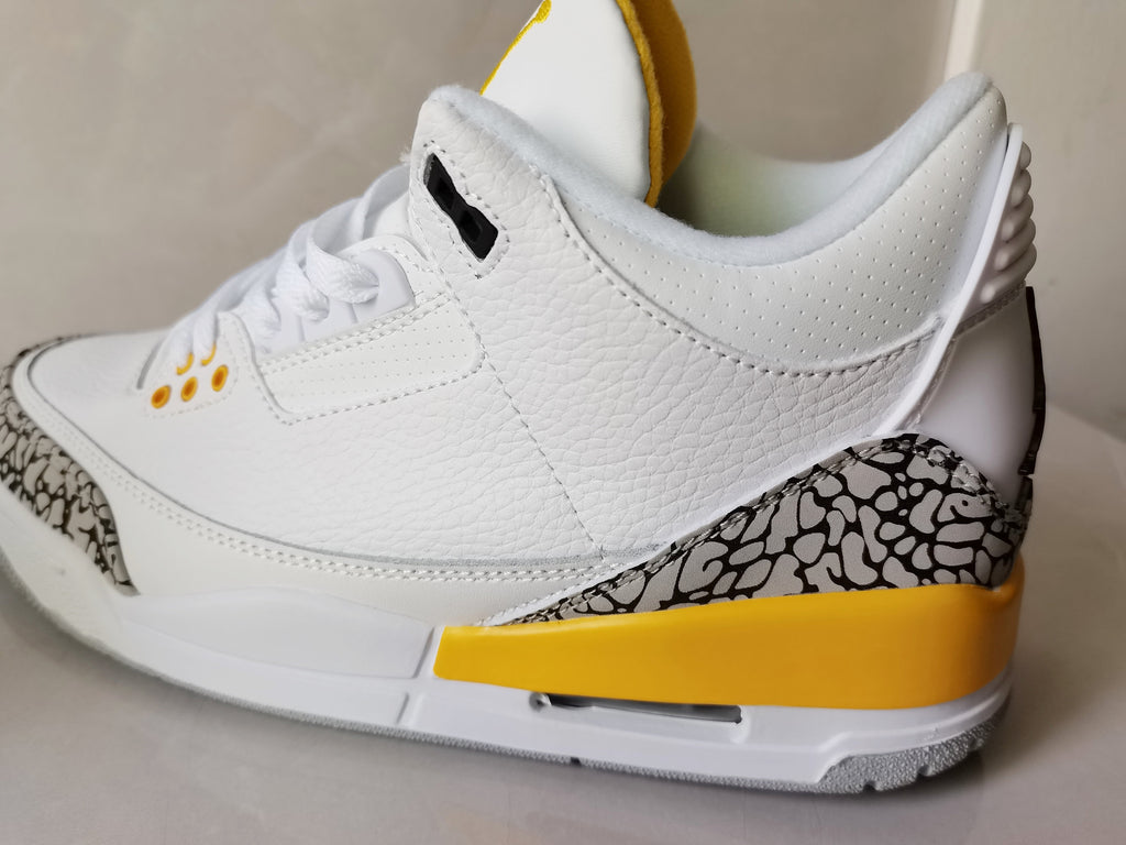 Air Jordan 3 Retro White and Yellow Sneakers - product image from the listing.