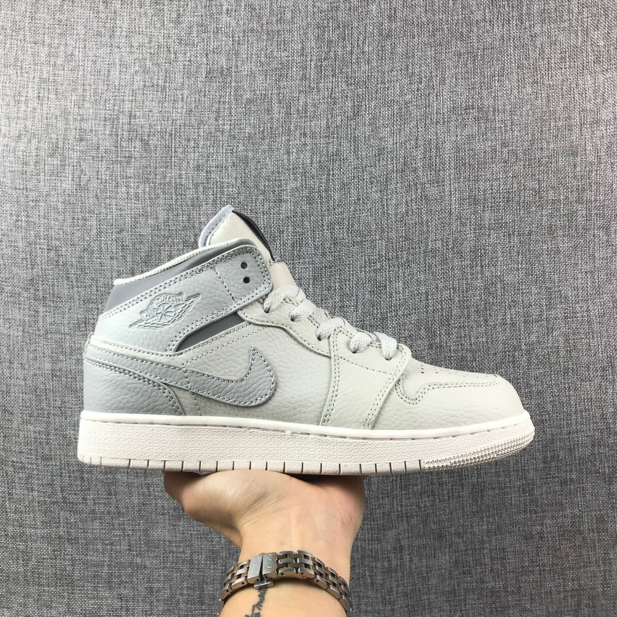 White and Grey Air Jordan 1 Mid Sneakers - product image from the listing.