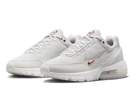 White and Red Running-Style Sneakers - Nike Air Max 270 - product image from the listing.
