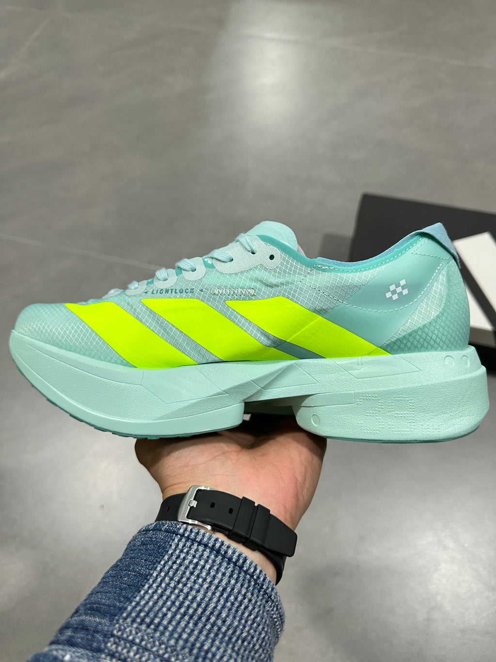 Nike Lightstrike Pro Running Shoes, in Mint Green and Volt - product image from the listing.