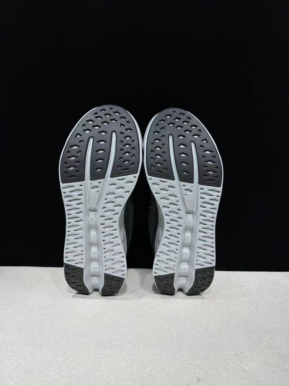 Black and Glacier On Cloudsurfer Running Shoes - product image from the listing.