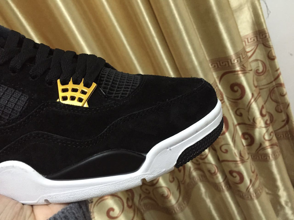 Jordan 4 High-Top Sneakers in Black and Gold - product image from the listing.