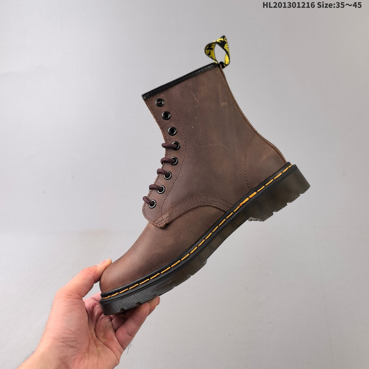 1460 Brown Platform Lace-Up Boots by Dr. Martens - product image from the listing.
