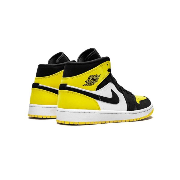 Air Jordan 1 Mid Yellow Toe in Black - product image from the listing.
