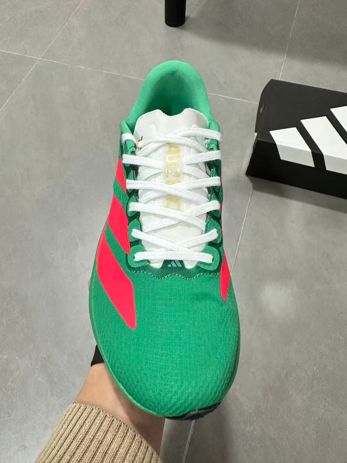 Adidas Lightstrike Pro Running Shoes in Green Red JQ4440 - product image from the listing.