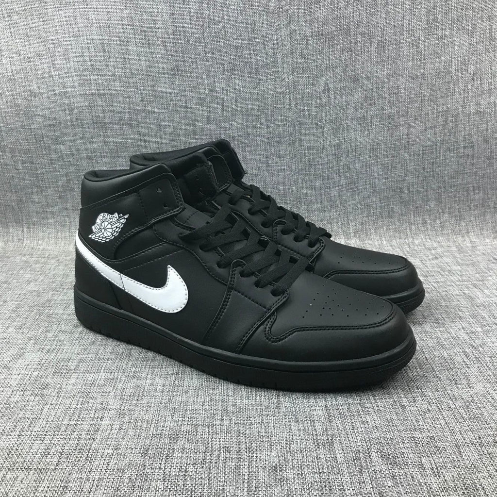 Air Jordan 1 Mid Sneakers in Black White 554724-049 - product image from the listing.