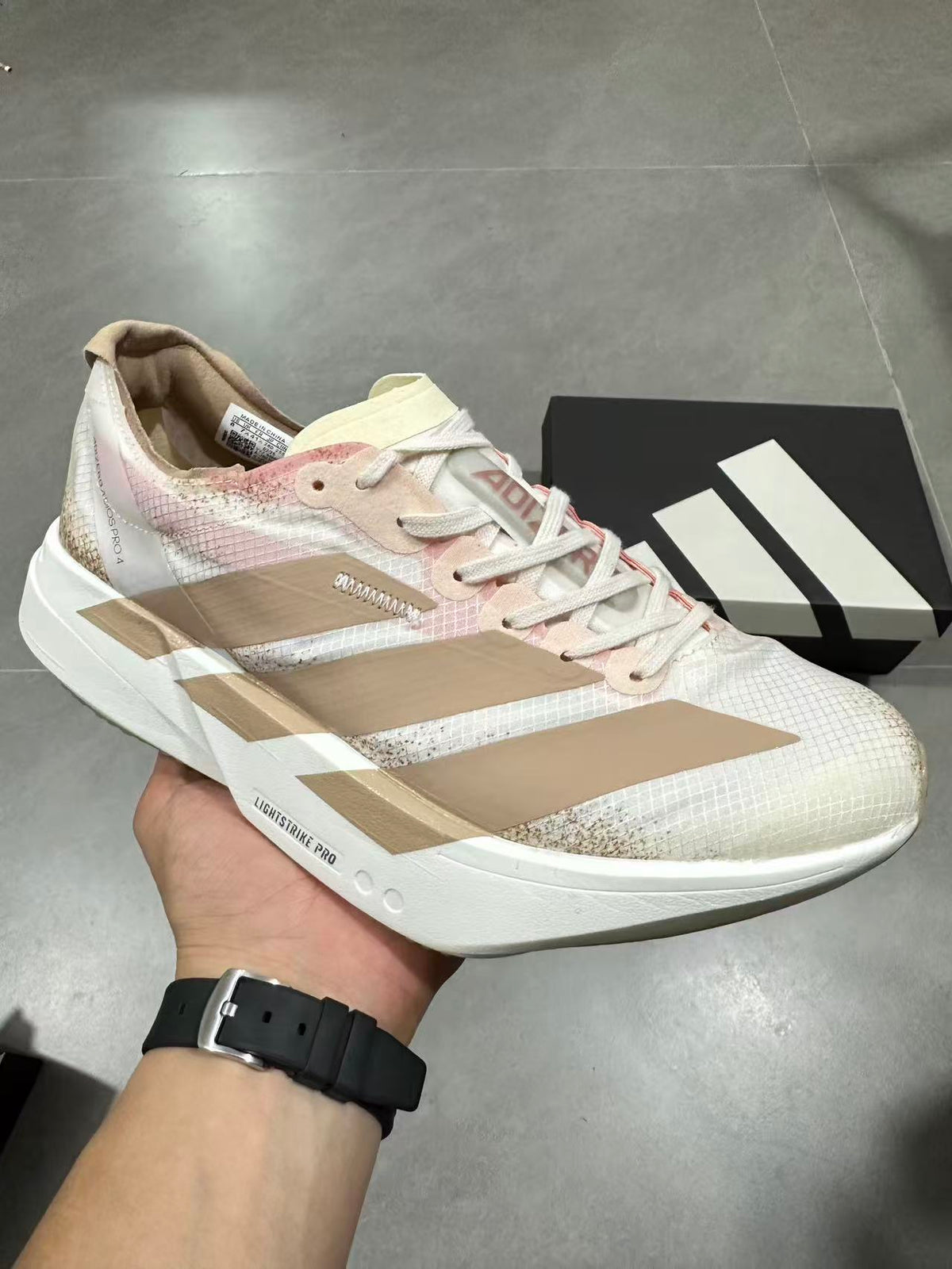 Nike Lightstrike Pro Running Shoes in White Pink Beige JR6359 - product image from the listing.