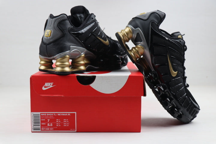 Black and Gold Nike Shox TL Sneakers - product image from the listing.