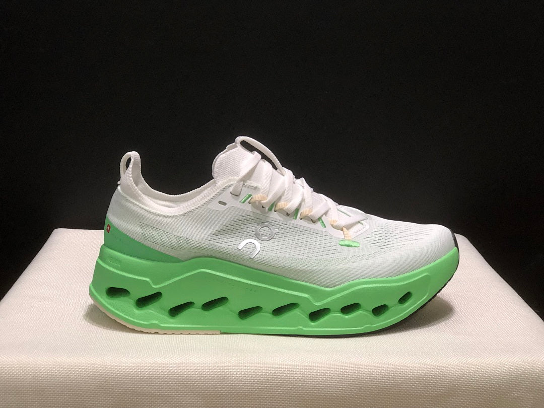 On Cloudsurfer Max Running Shoes in White Green - product image from the listing.
