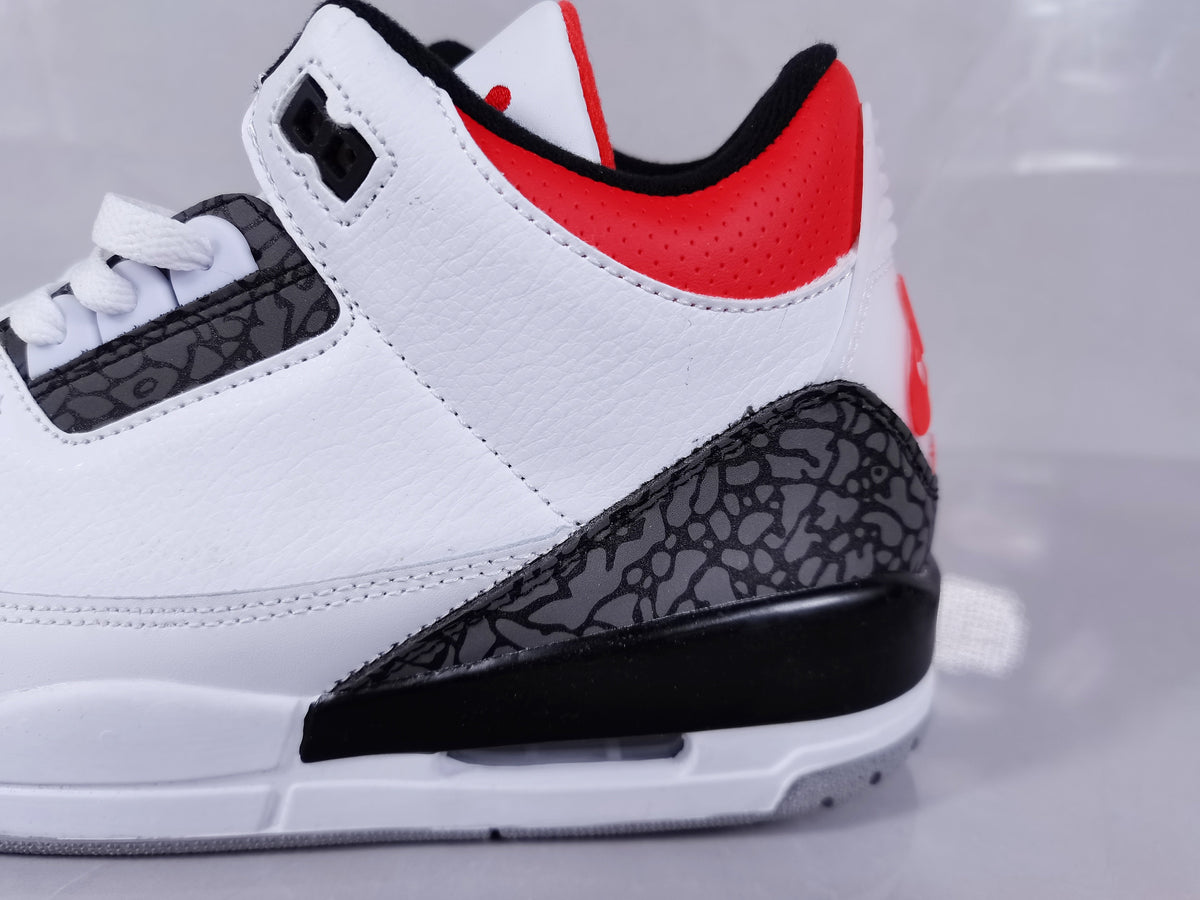 Air Jordan 3 Retro SE White Cement Fire Sneakers in Red - product image from the listing.