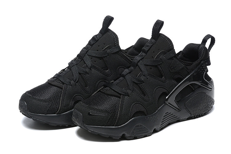 Nike Air Huarache Sneakers in Black - product image from the listing.