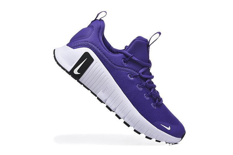 Nike Free Low-Top Sneakers in Purple - product image from the listing.