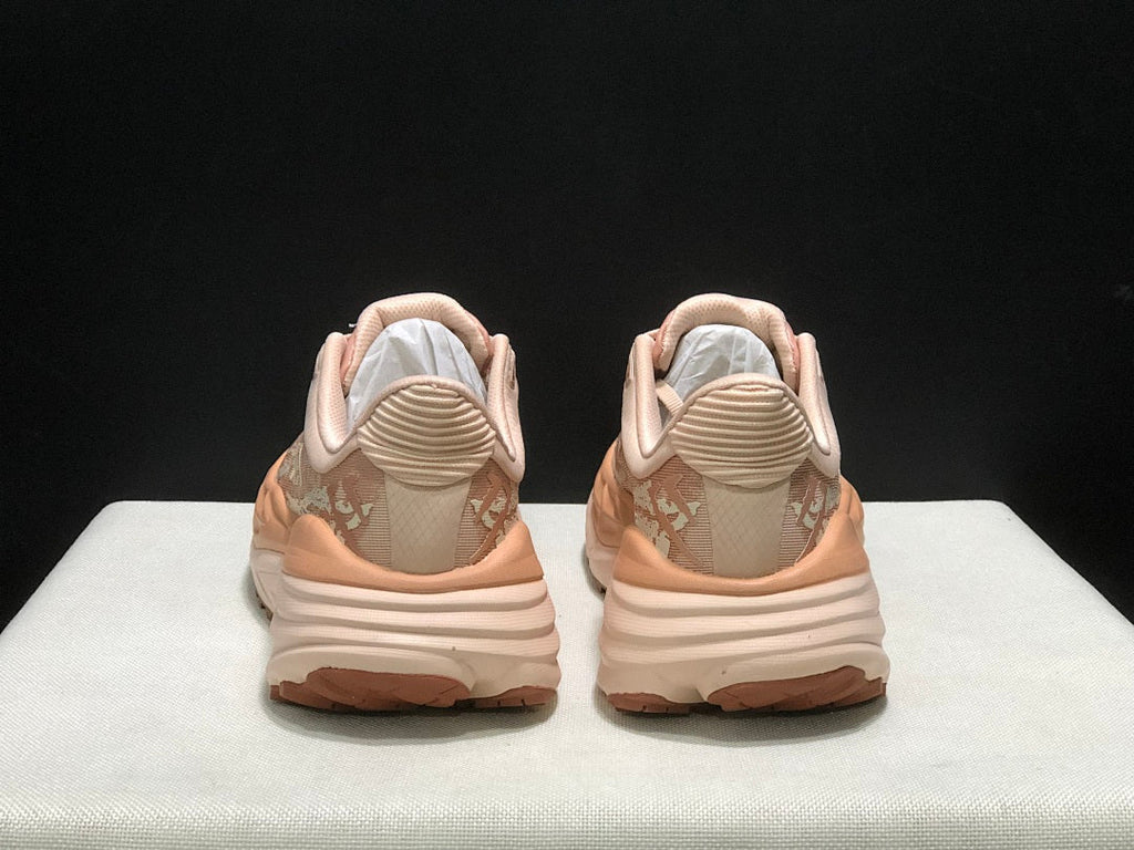 HOKA Stinson 7 Trail Running Shoes in Blush and in Cream - product image from the listing.