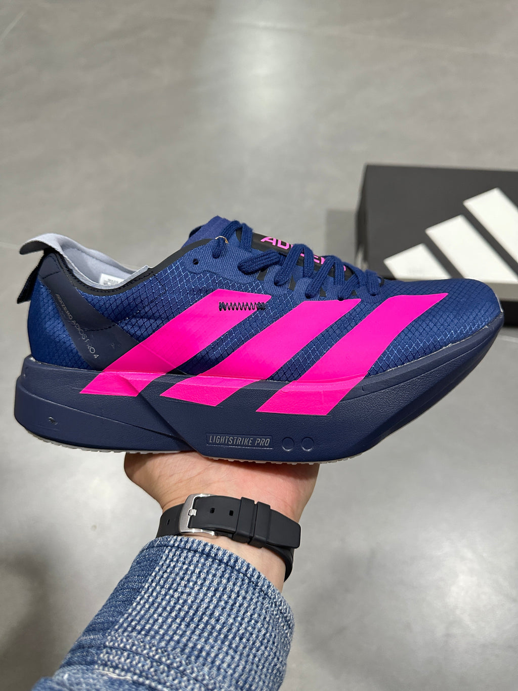 adidas Lightstrike Pro Running Shoes in Blue Pink JR6369 - product image from the listing.