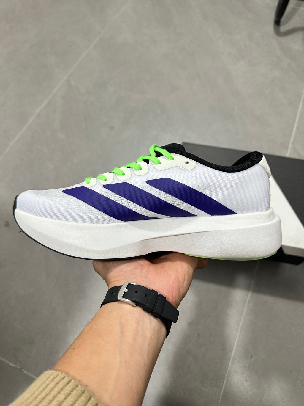 Adizero Lightstrike Pro Running Shoes in White Purple Green - product image from the listing.
