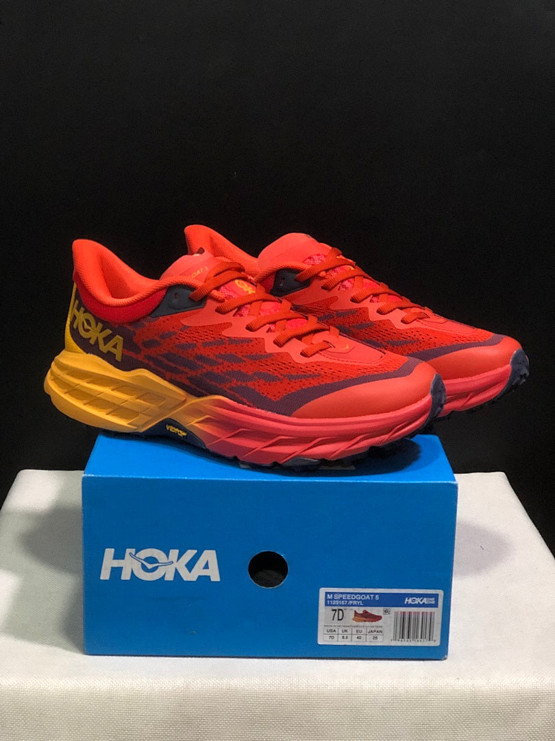 HOKA Speedgoat 5 Trail Running Shoes in Red and Yellow - product image from the listing.