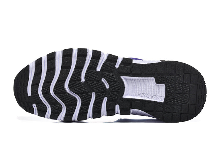 Nike Free Low-Top Sneakers in Purple - product image from the listing.