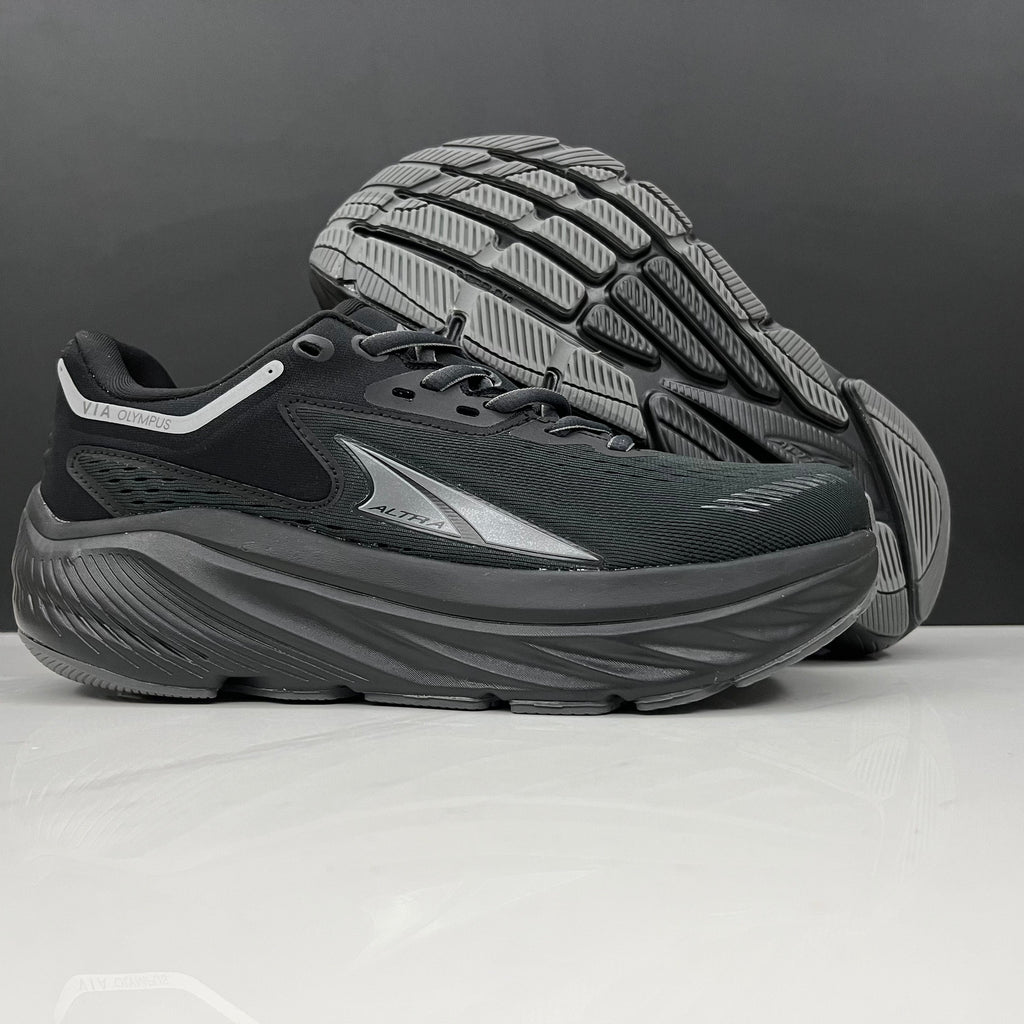 Altra Via Olympus Running Sneakers in Black - product image from the listing.