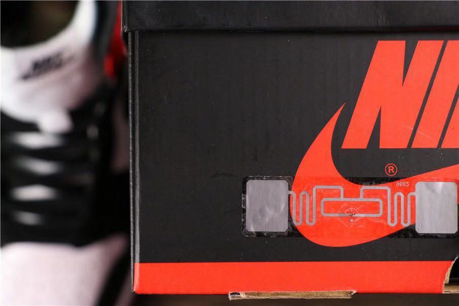 Air Jordan 1 Satin Black Toe High-Cut Sneakers - product image from the listing.