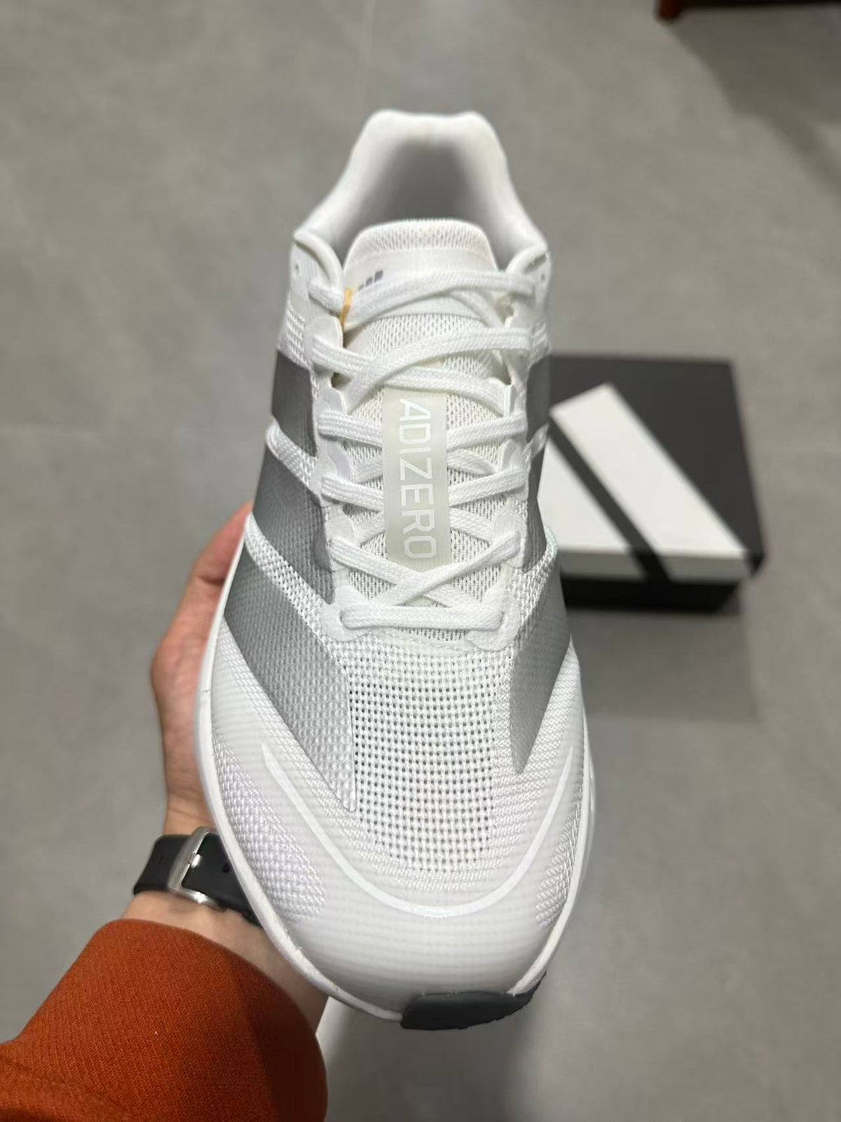 Adidas Adizero Lightstrike Pro Running Shoes in White - product image from the listing.