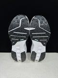 On Cloudsurfer Trail Trail Running Shoes in Black and White - product image from the listing.
