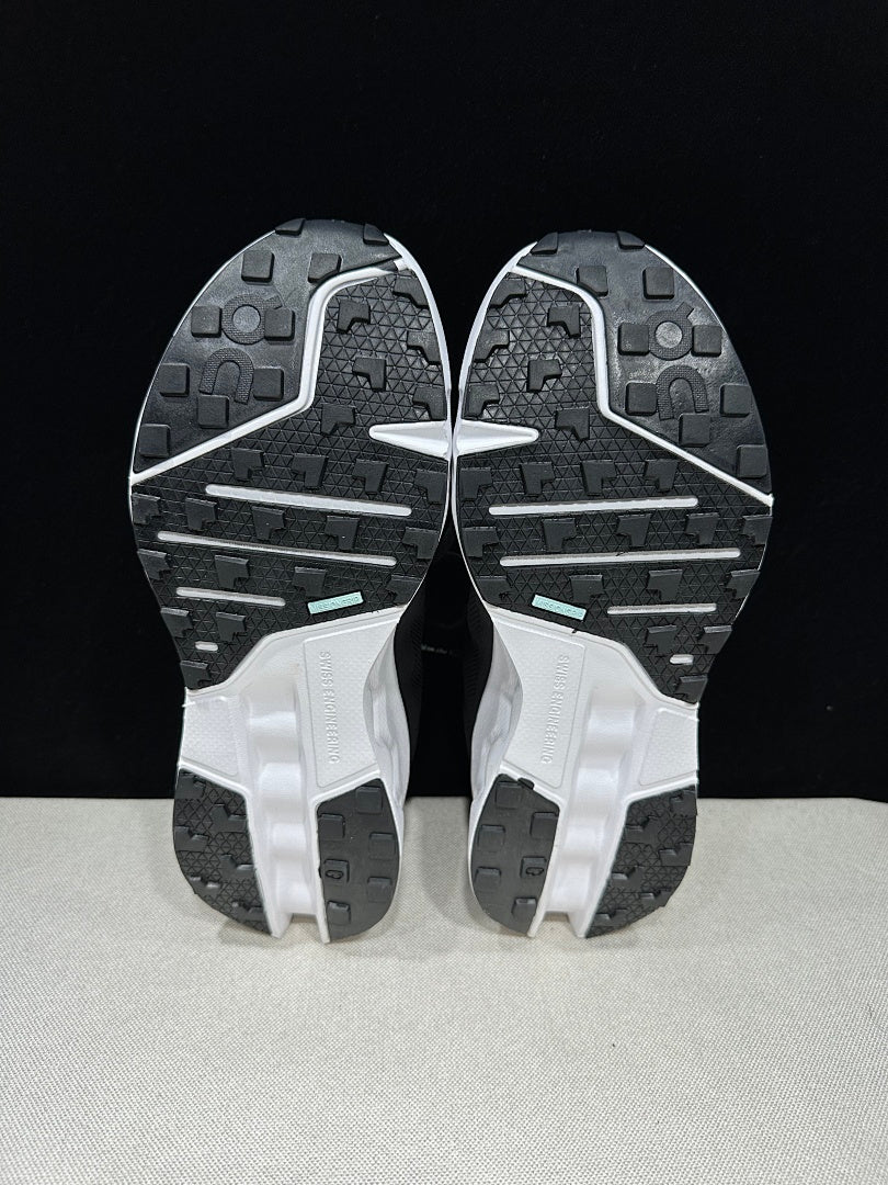 On Cloudsurfer Trail Trail Running Shoes in Black and White - product image from the listing.