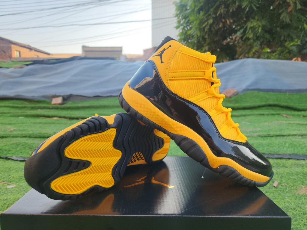 "Orange/Yellow/Black" Air Jordan 11 Retro - product image from the listing.