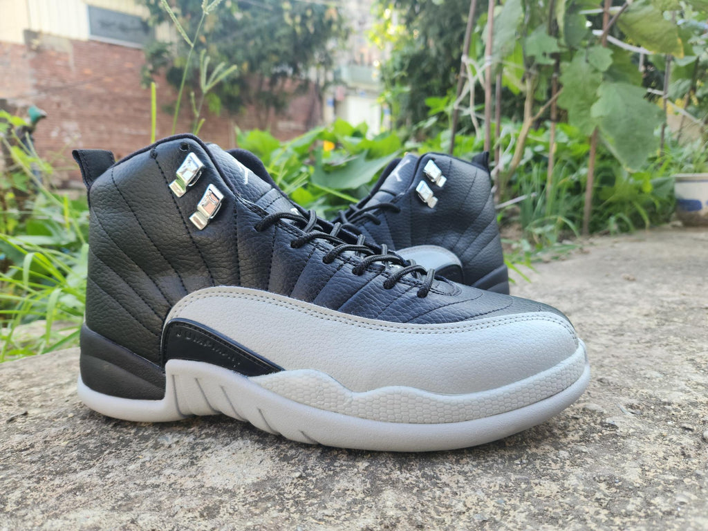 Air Jordan 12 Retro in Black/Light Grey - product image from the listing.