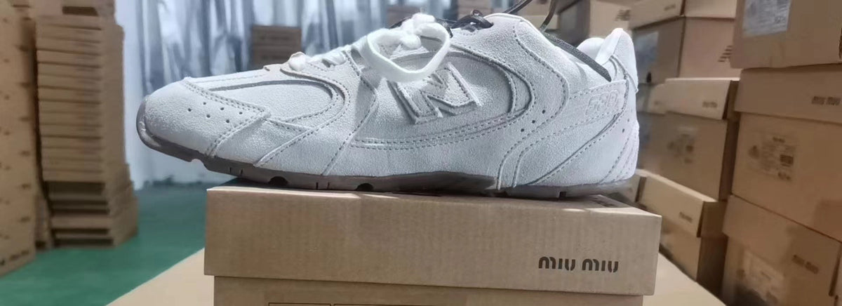 Light Gray Miu Miu Suede Low-Top Sneakers - product image from the listing.