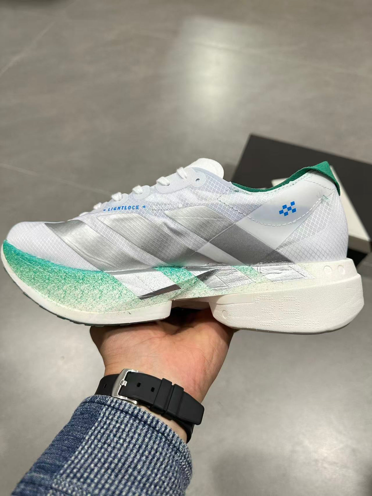 Adidas Adizero Prime X 2 Strung Running Shoes in White Green - product image from the listing.