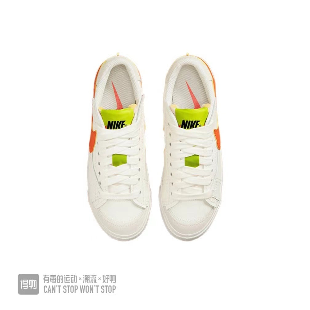 Nike Blazer Low 77 Sneakers in White Orange Volt - product image from the listing.