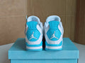"Forget Me Not" Air Jordan 4 Retro - product image from the listing.