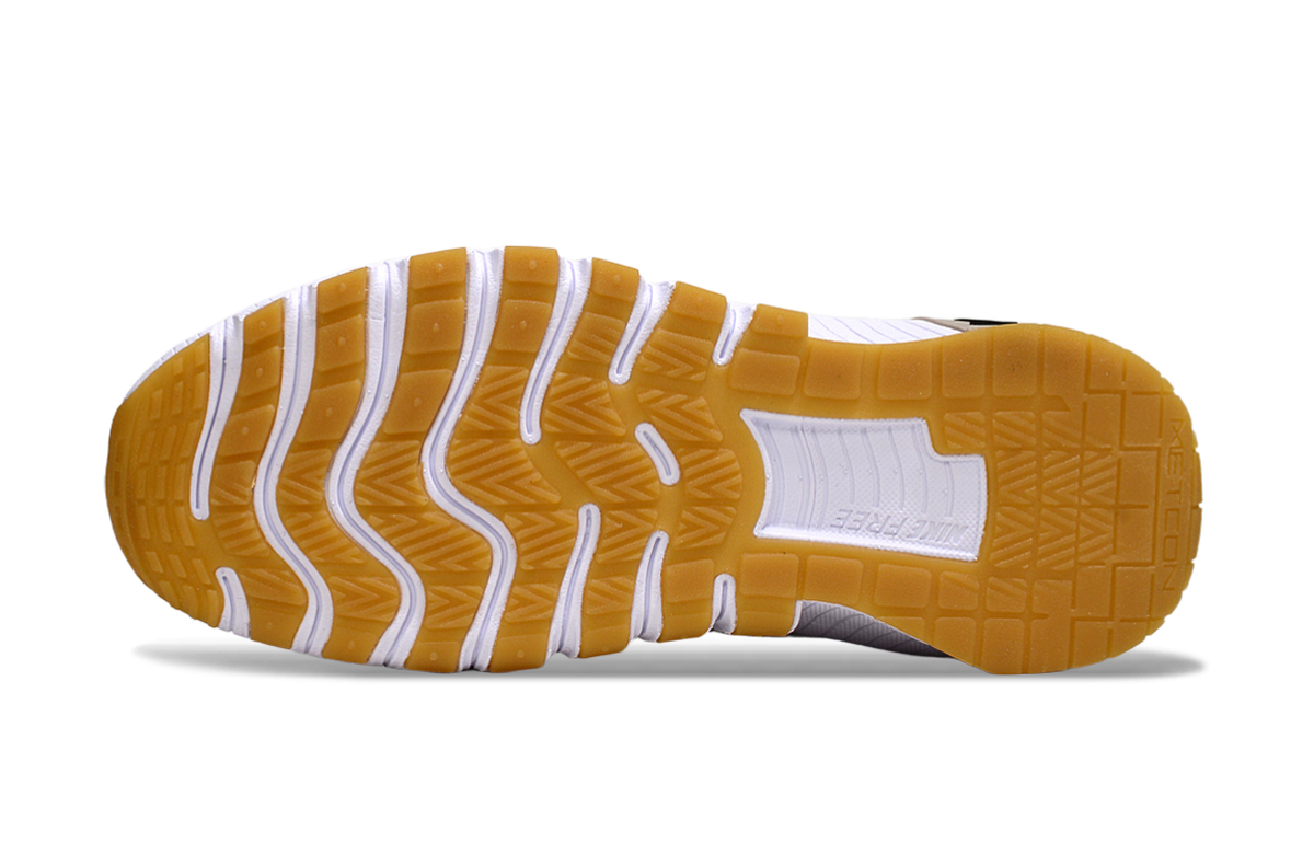 Nike Free White Trainers with Gum Outsole - product image from the listing.