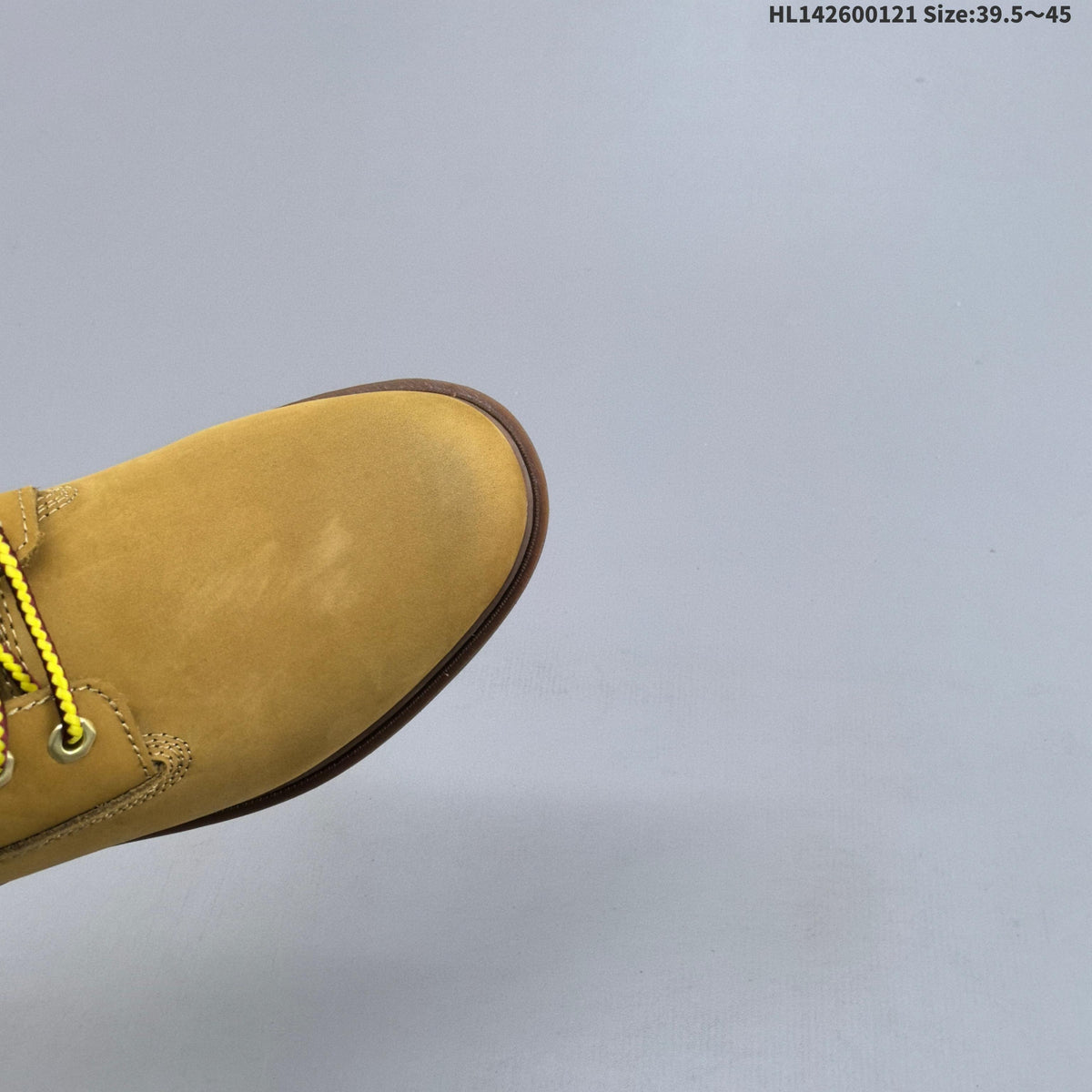 Yellow Mid-Top Lace-Up Boots by Timberland - product image from the listing.