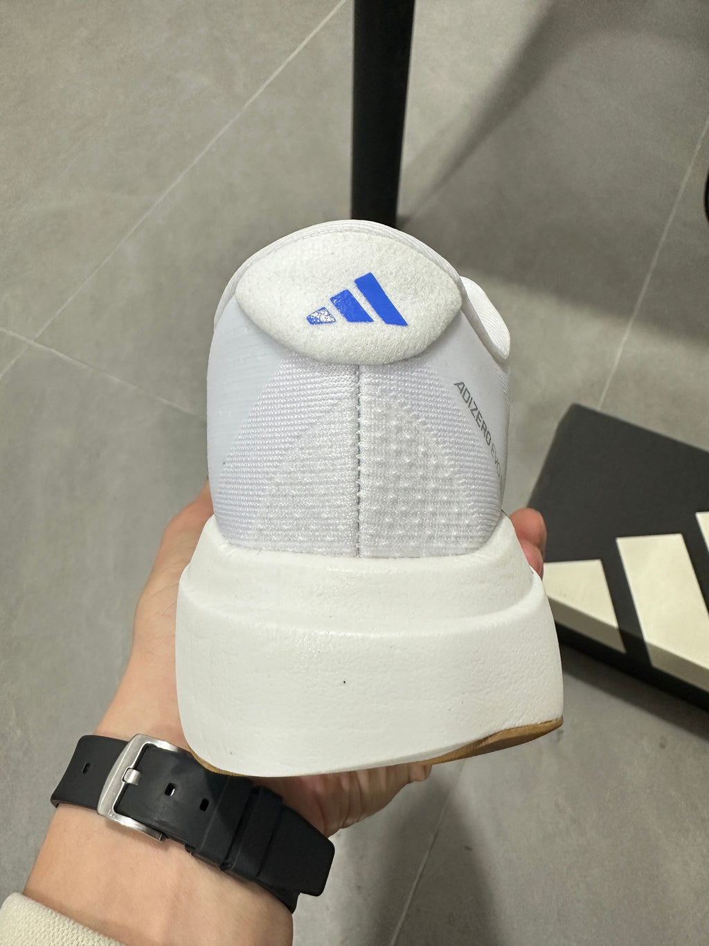 Adidas Lightstrike Pro Running Shoes in White Blue JS4454 - product image from the listing.