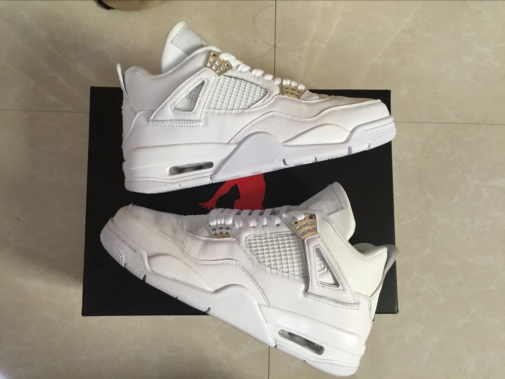 Air Jordan 4 Retro White High-Top Sneakers - product image from the listing.