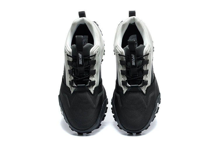 The North Face Black and White Trail Trainers - product image from the listing.