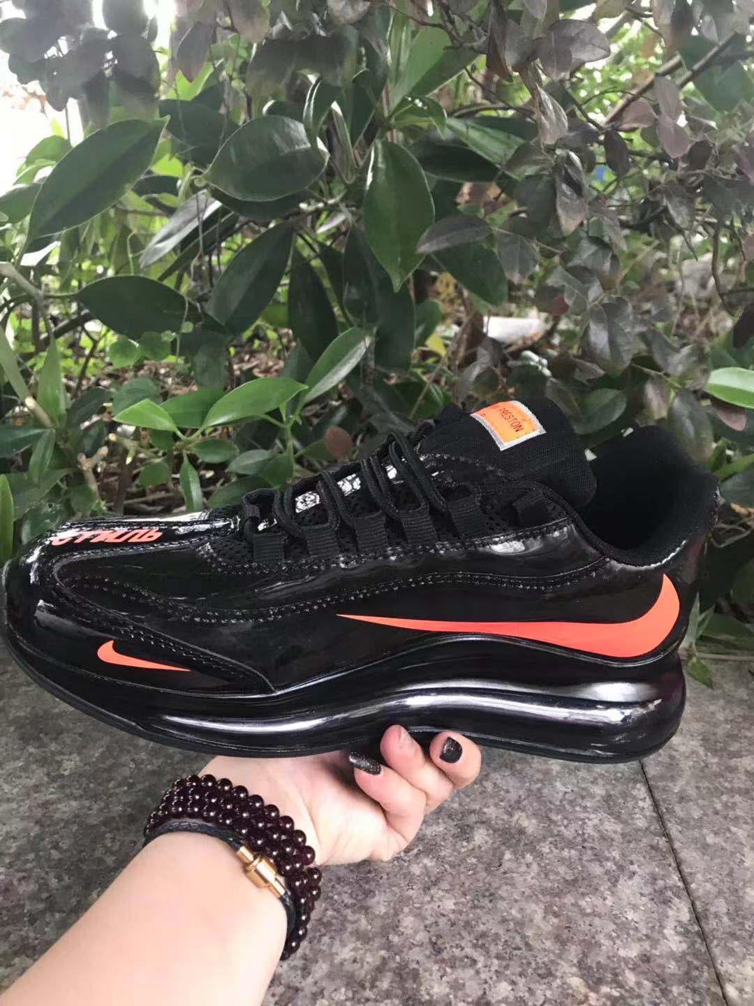 Nike Air Max 720 Sneakers in Black and Bright Orange - product image from the listing.