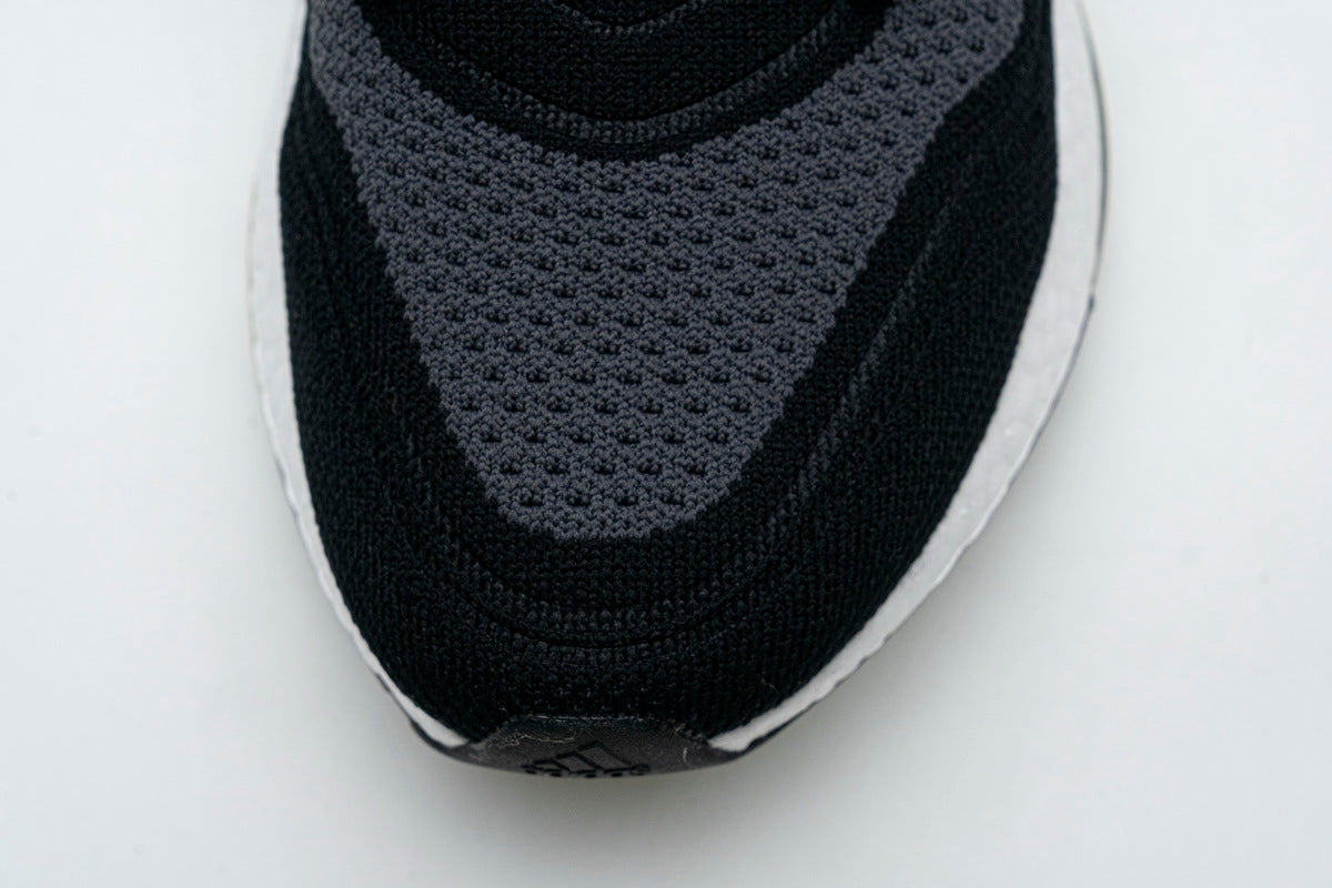 adidas Ultraboost 21 Running Shoes FY0374 in Black - product image from the listing.