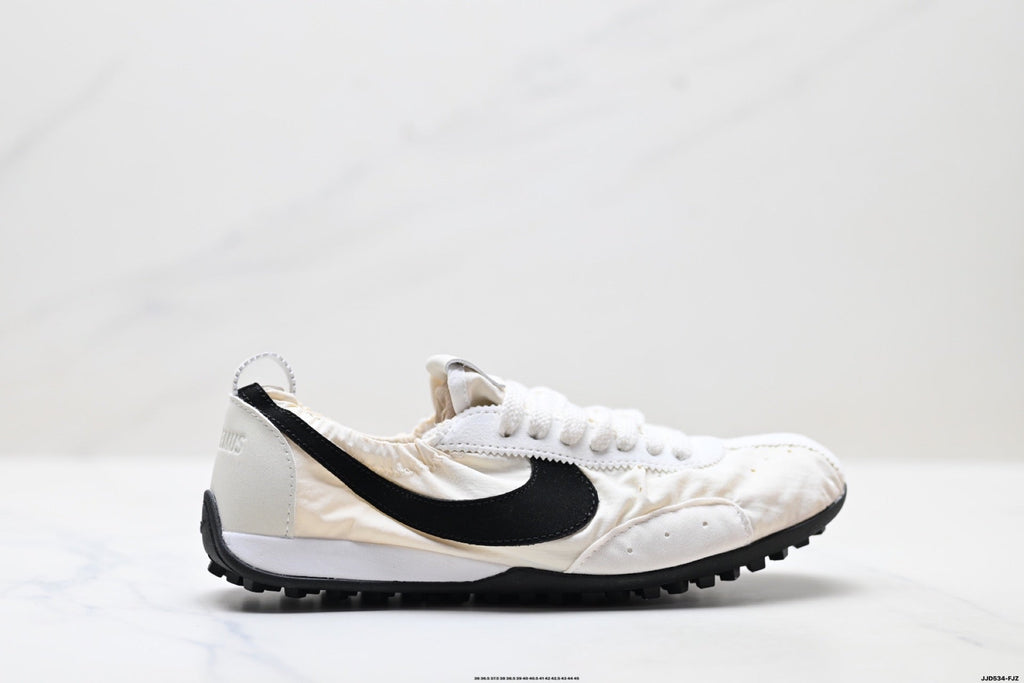 Jacquemus x Nike Jacumoon Low-Top Sneakers, in White and Black - product image from the listing.