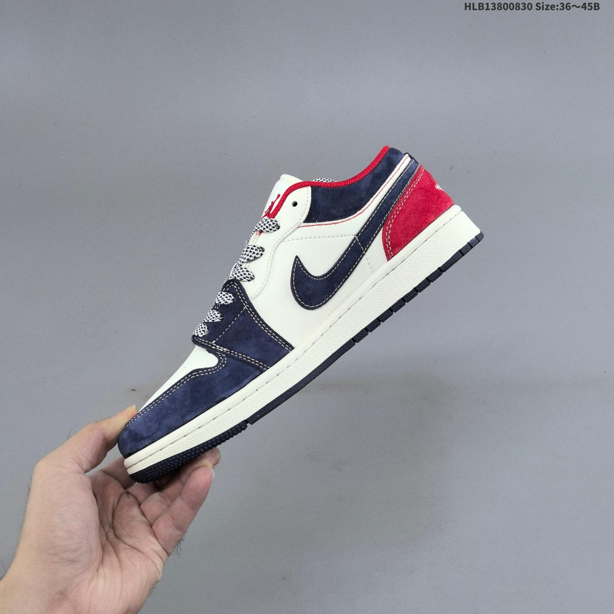 Nike Air Jordan 1 Low Sneakers in White, in Navy and Red - product image from the listing.